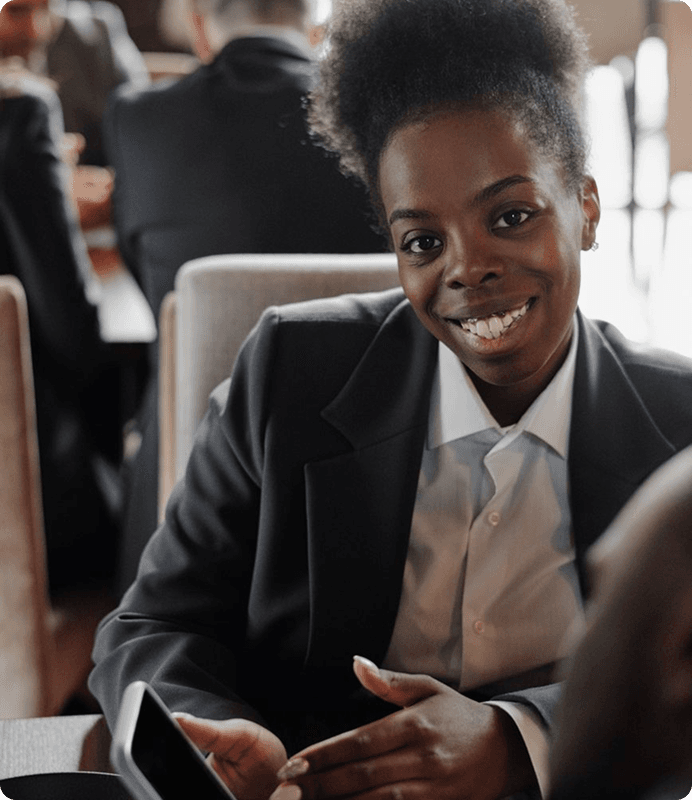A professional smiling during a meeting